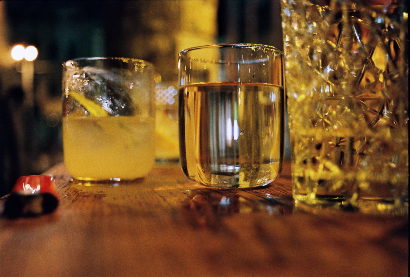 Glasses on a bar table at night